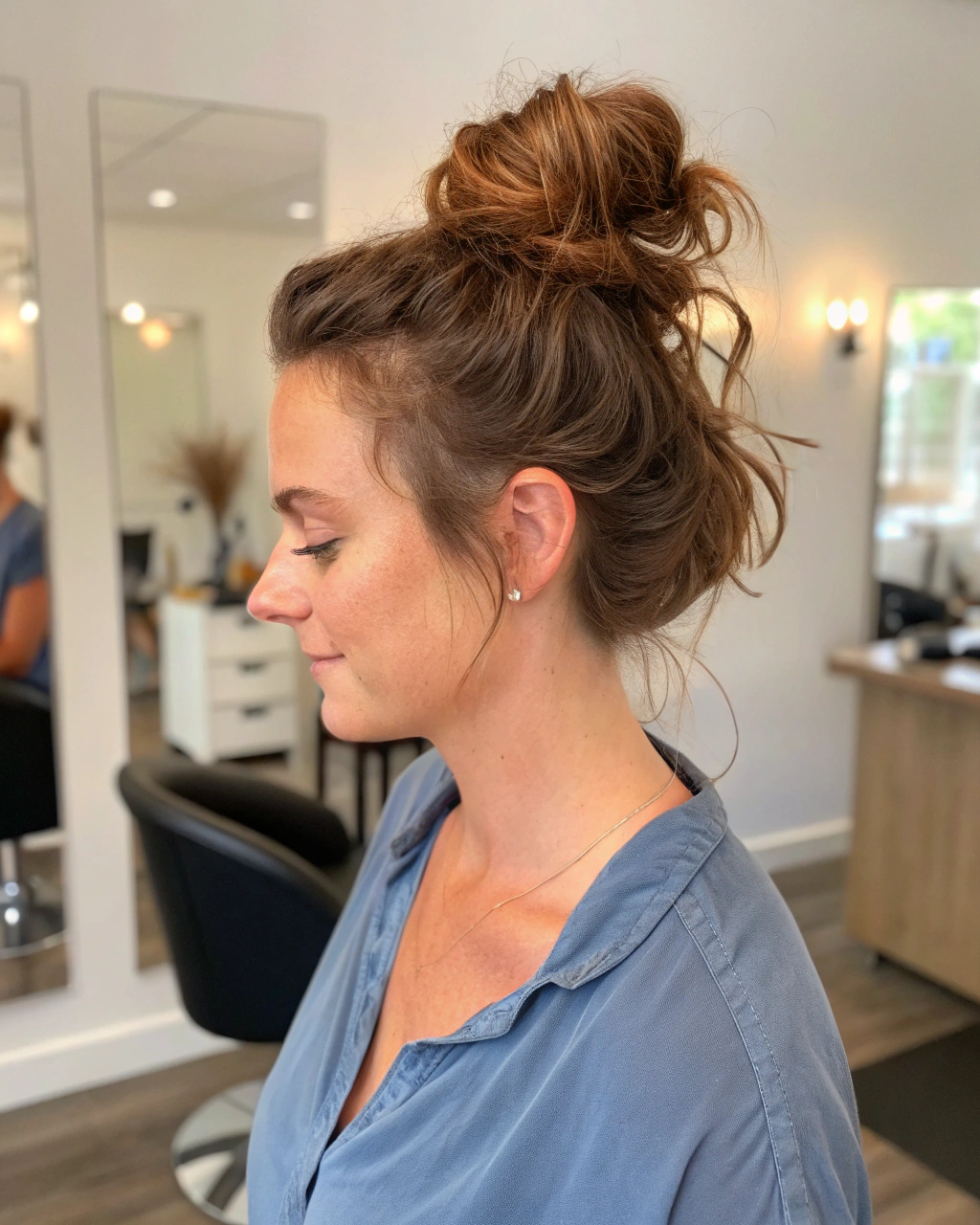 14. Messy bun with volume at the crown