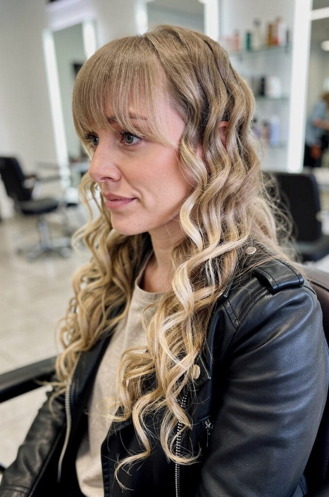 Curls with soft curtain bangs