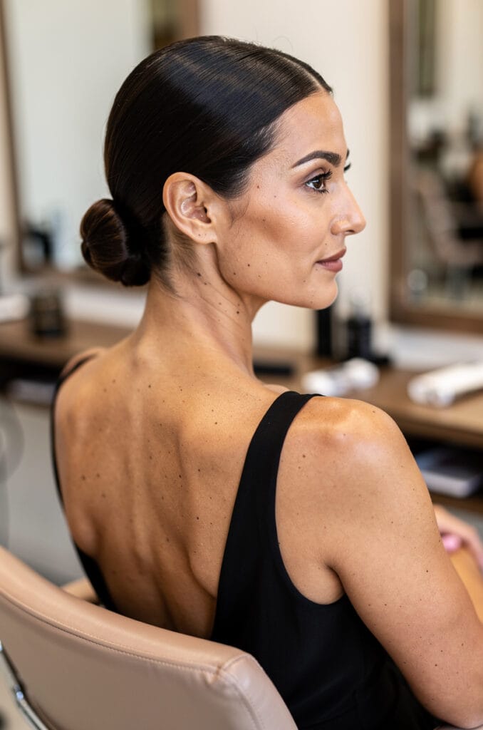 Sleek straight with a low knot