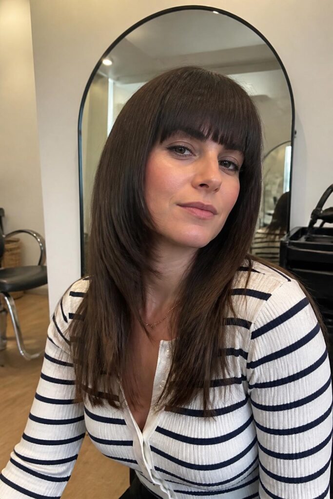Blunt bangs with straight hair and layers 683x1024 1
