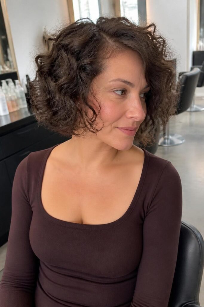 Curly bob with side part 1 683x1024 1