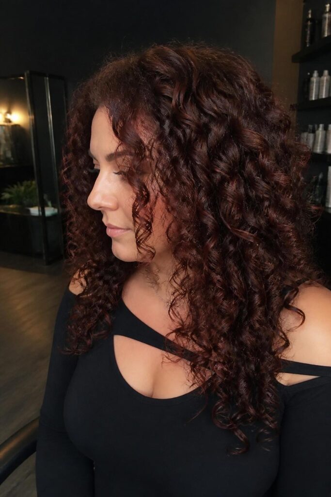 6. Dark auburn curls