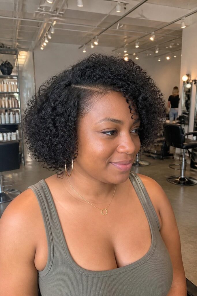 Curly bob with side part