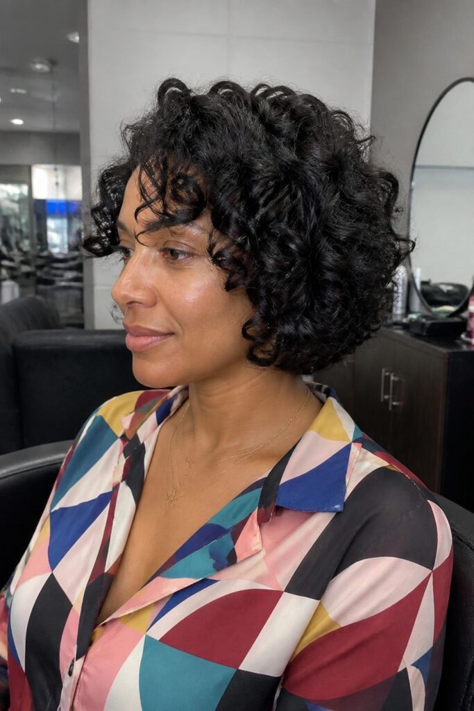 Curly hush cut bob