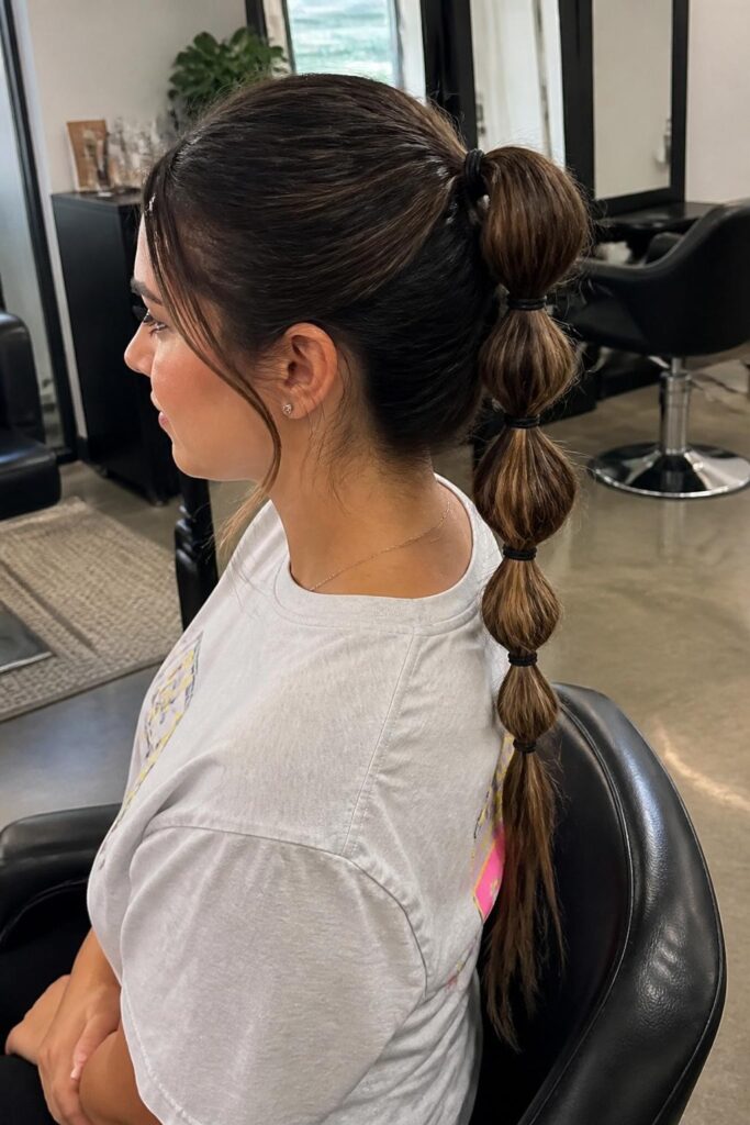 Half up bubble ponytail