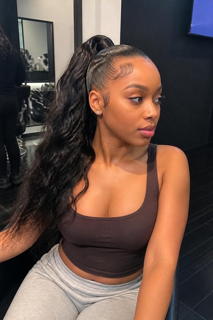 High ponytail with a side sweep