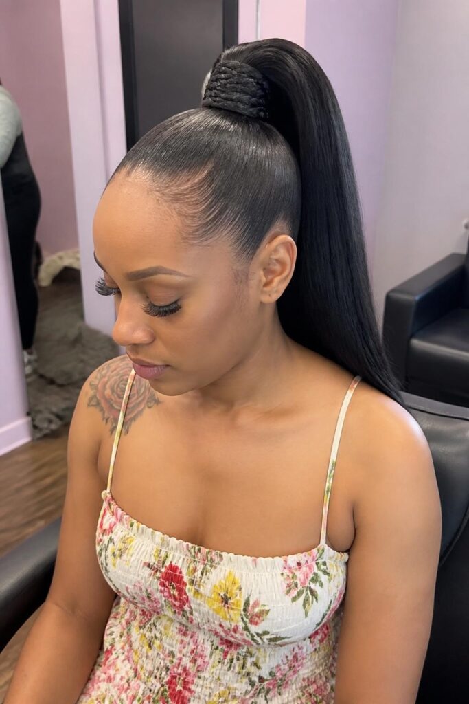 High ponytail with braided accents