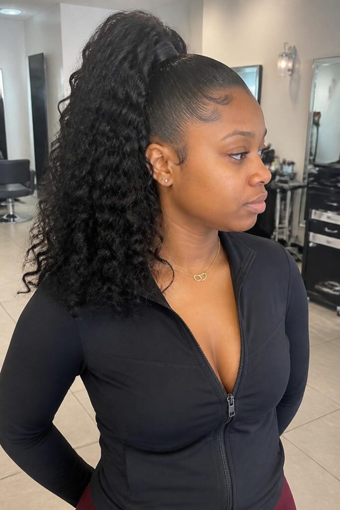 High ponytail with curls