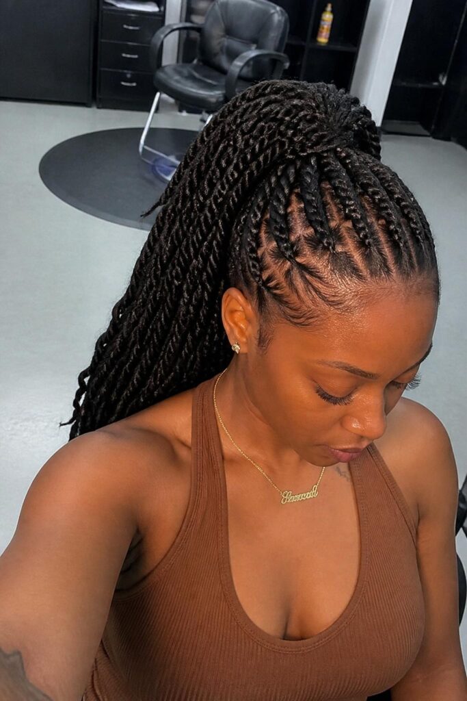 High ponytail with twists
