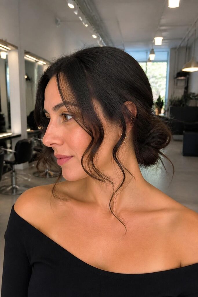 Low bun with face-framing curls