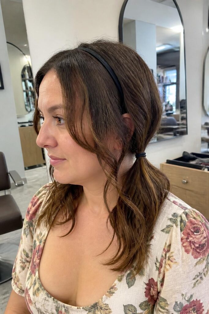 Low pigtails with a headband