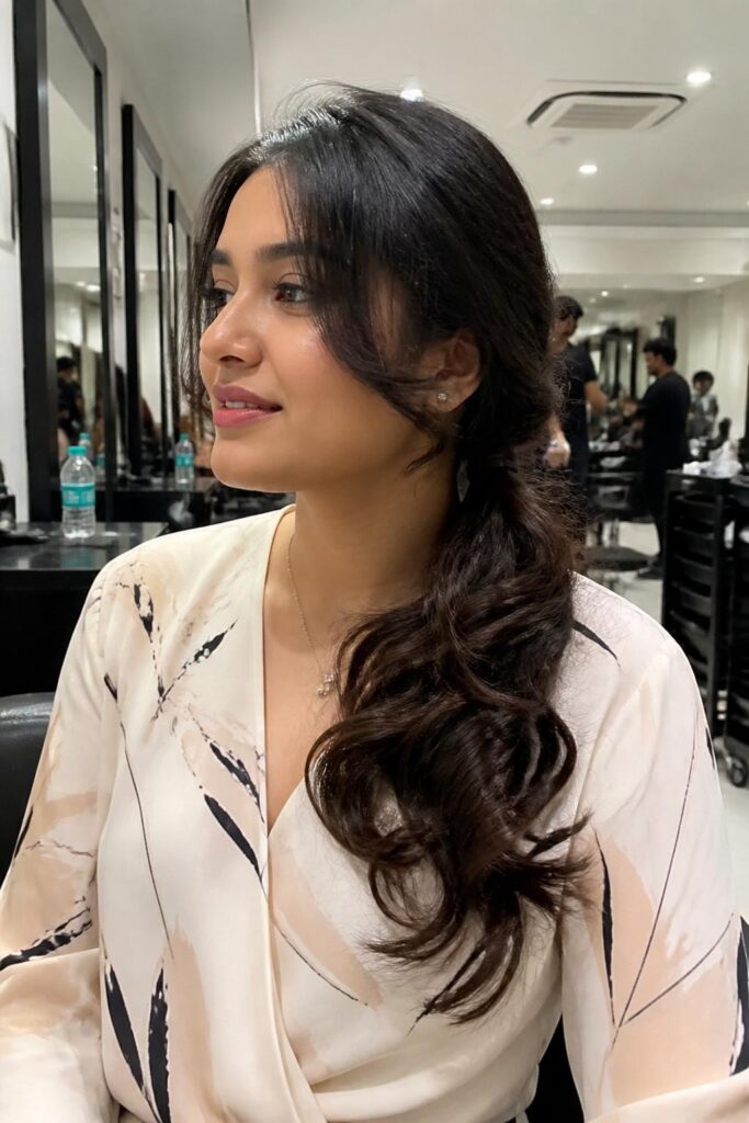 Low side ponytail with curls