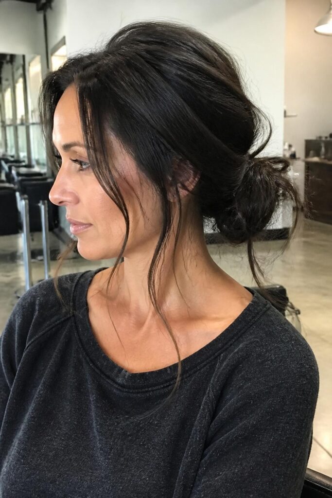 Messy textured low bun