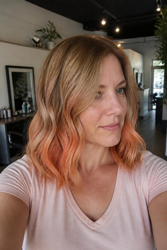Strawberry blonde to peach ombre