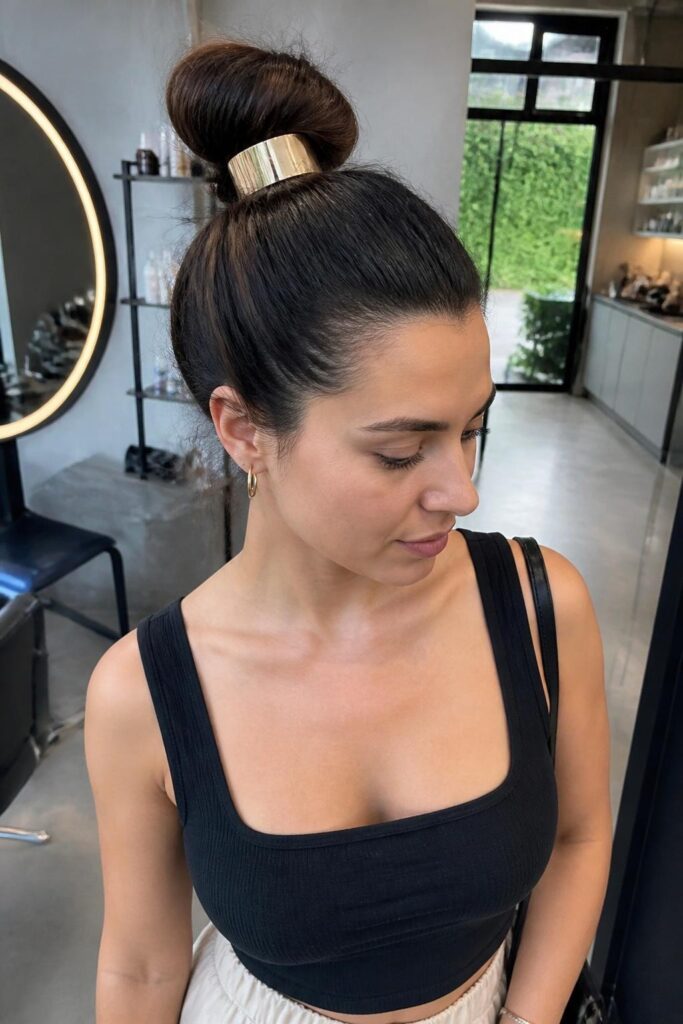 The low-profile high bun with hair cuff