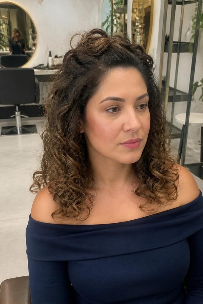 The pinned back curls