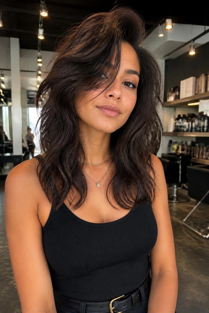 Tousled wolf cut with side part