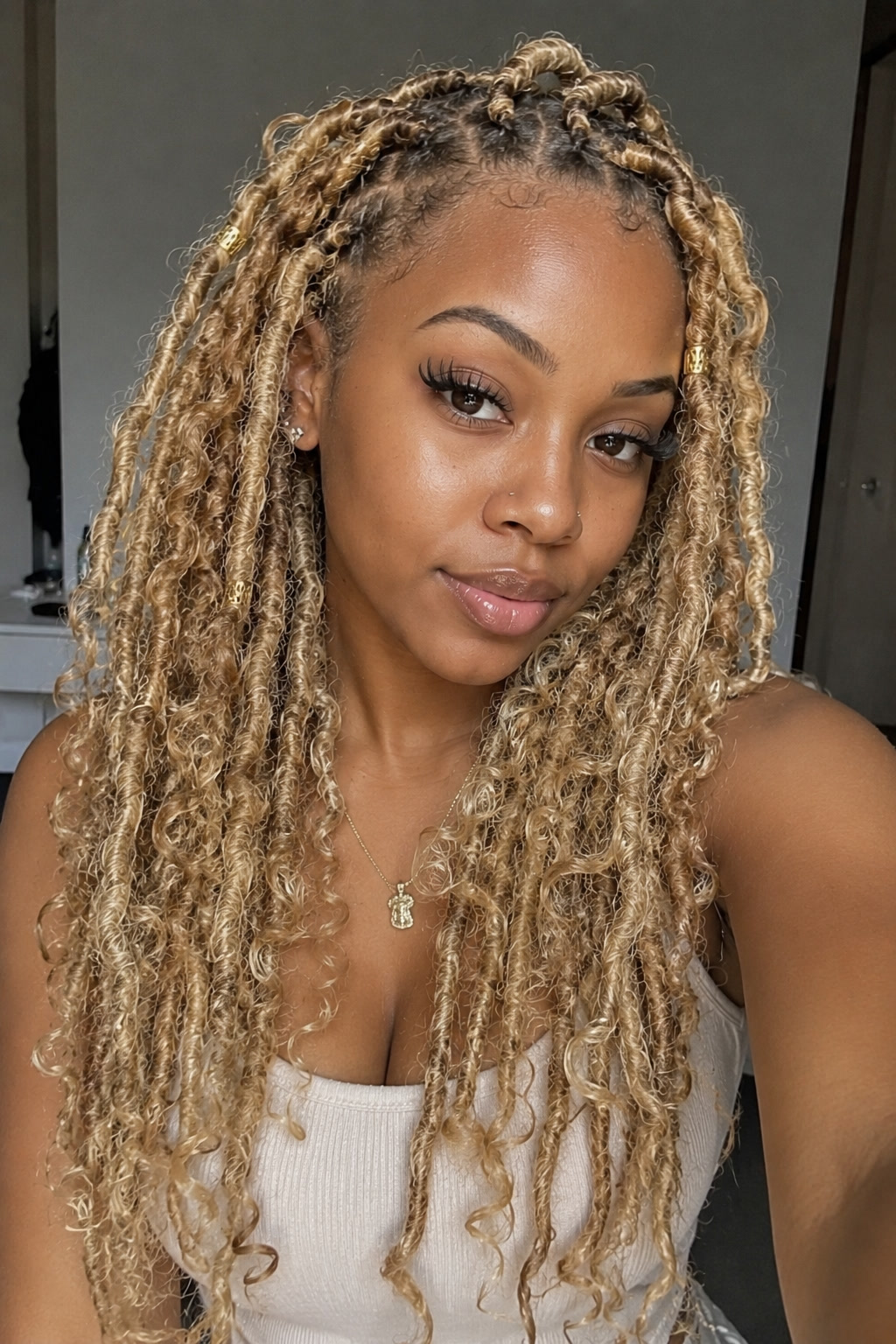 7. Blonde butterfly locs