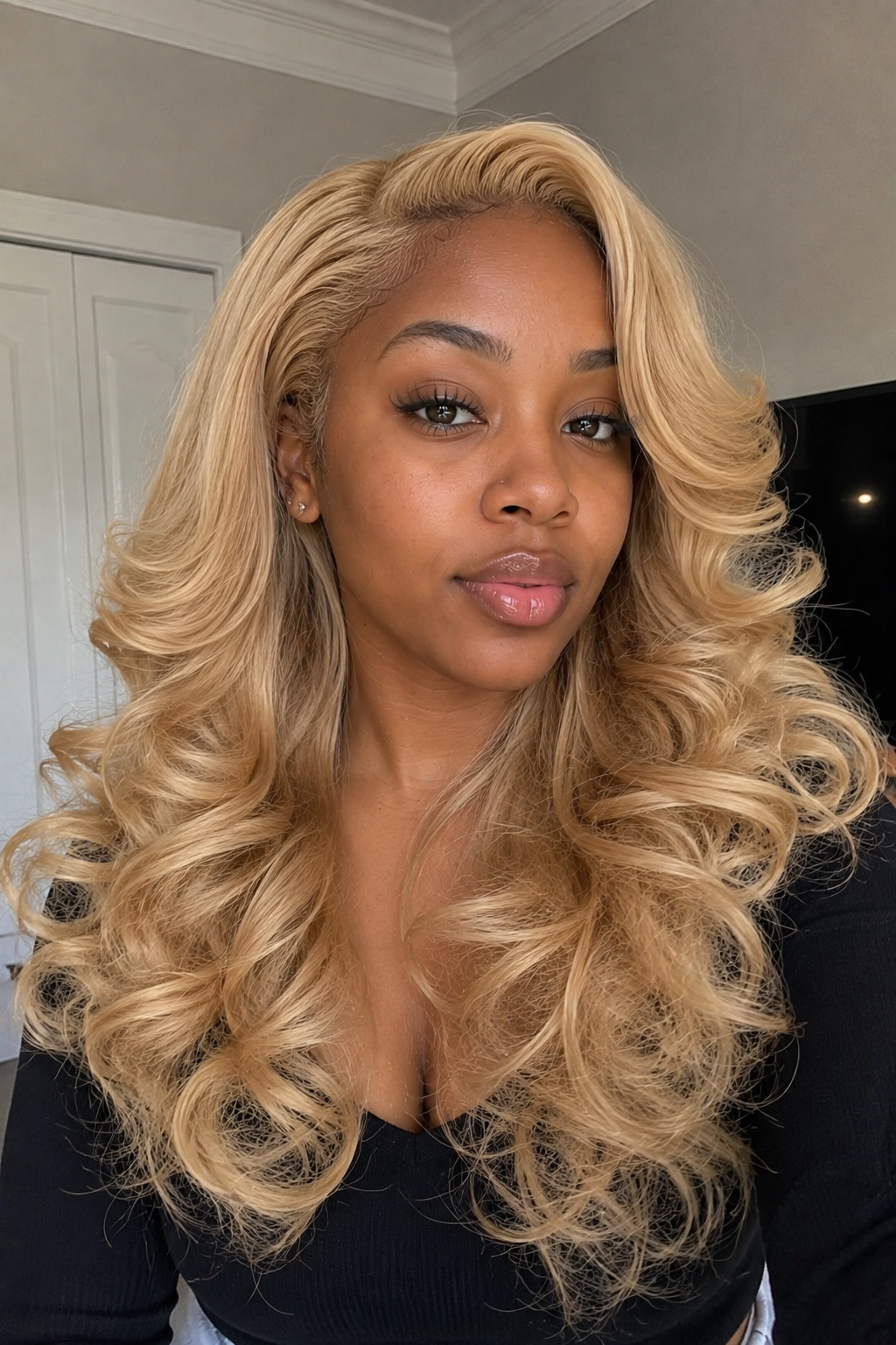 11. Blonde curly blowout wig