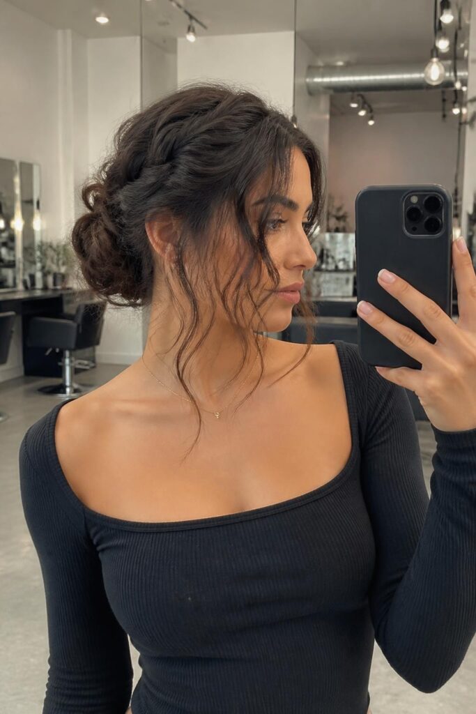 14. Braided low bun with wavy edges