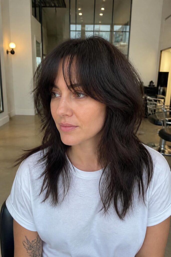 3. Shaggy wolfcut with curtain bangs