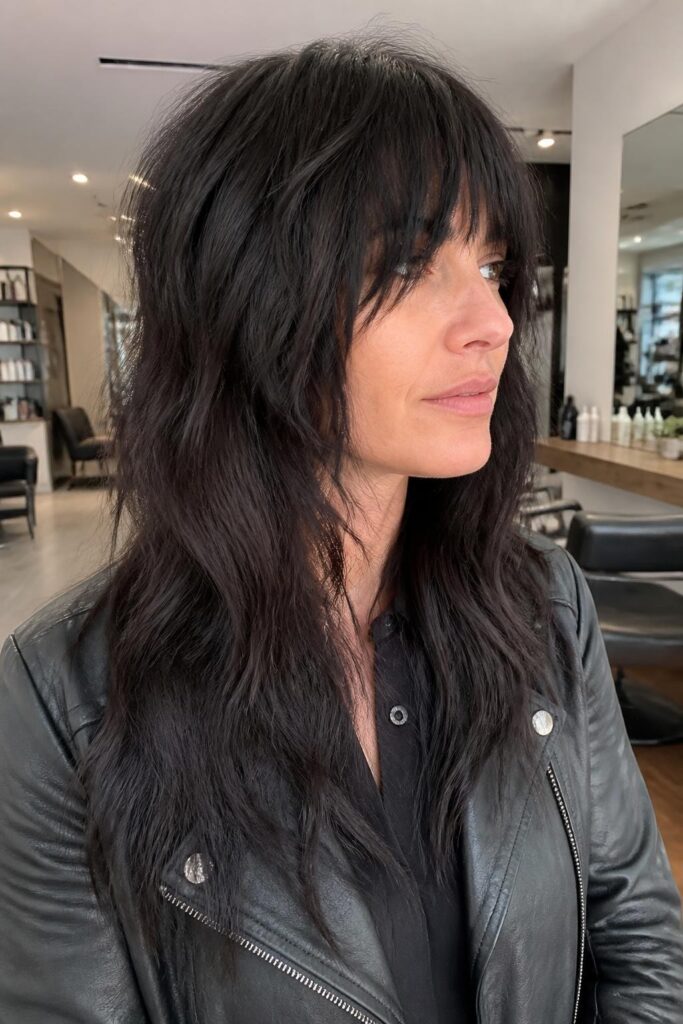 4. Long wolf cut with shaggy bangs