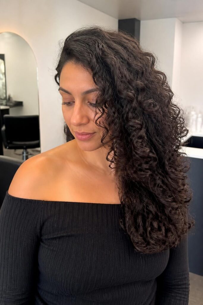 Side swept curls for a sleek look