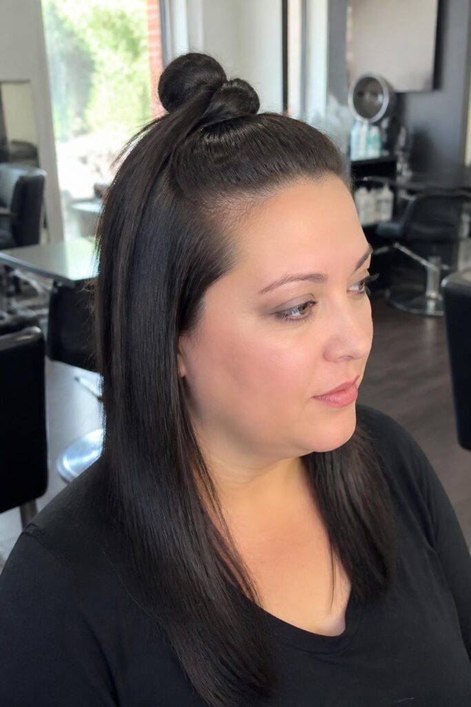 Straight hair with a half-up top knot