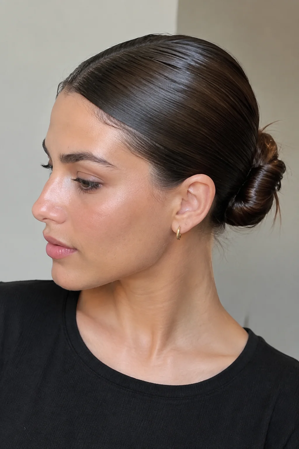 Slicked-Back Low Bun hairstyle