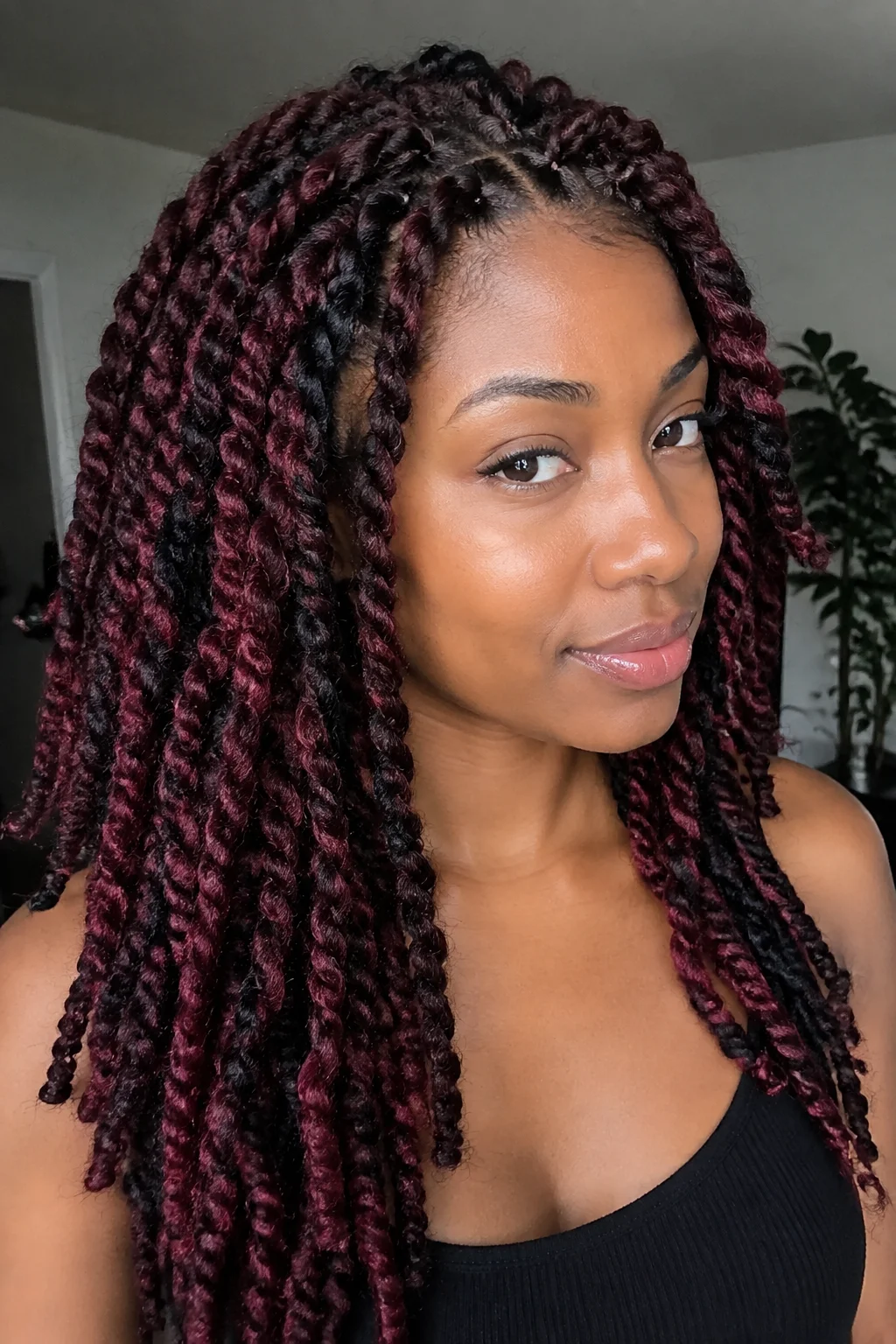 Rich Burgundy Accent Twists hairstyle