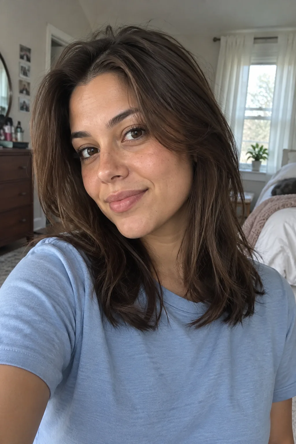 Feathered Layers With a Center Part hairstyle
