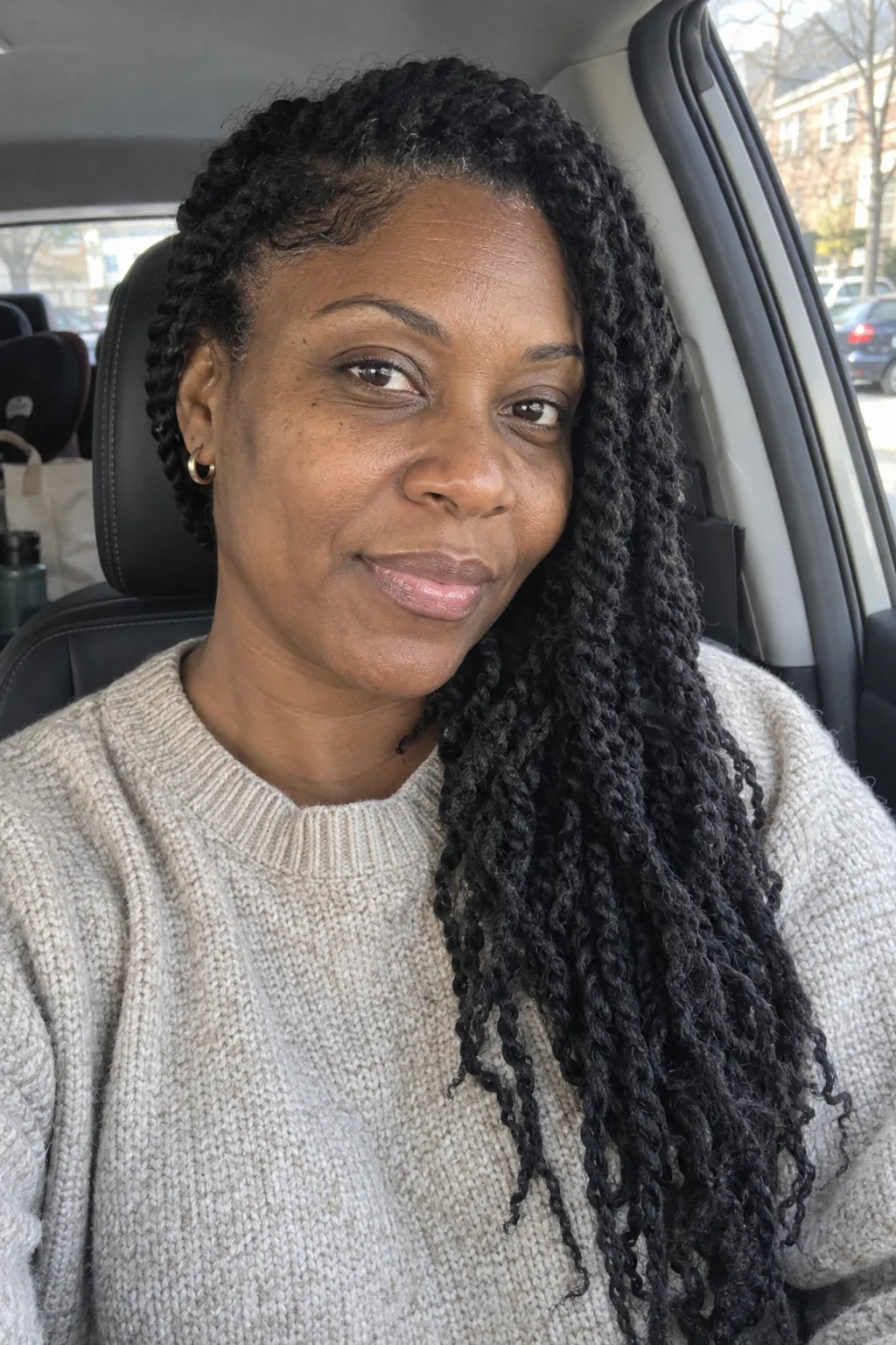 Side-Part Twists Swept Over One Shoulder hairstyle