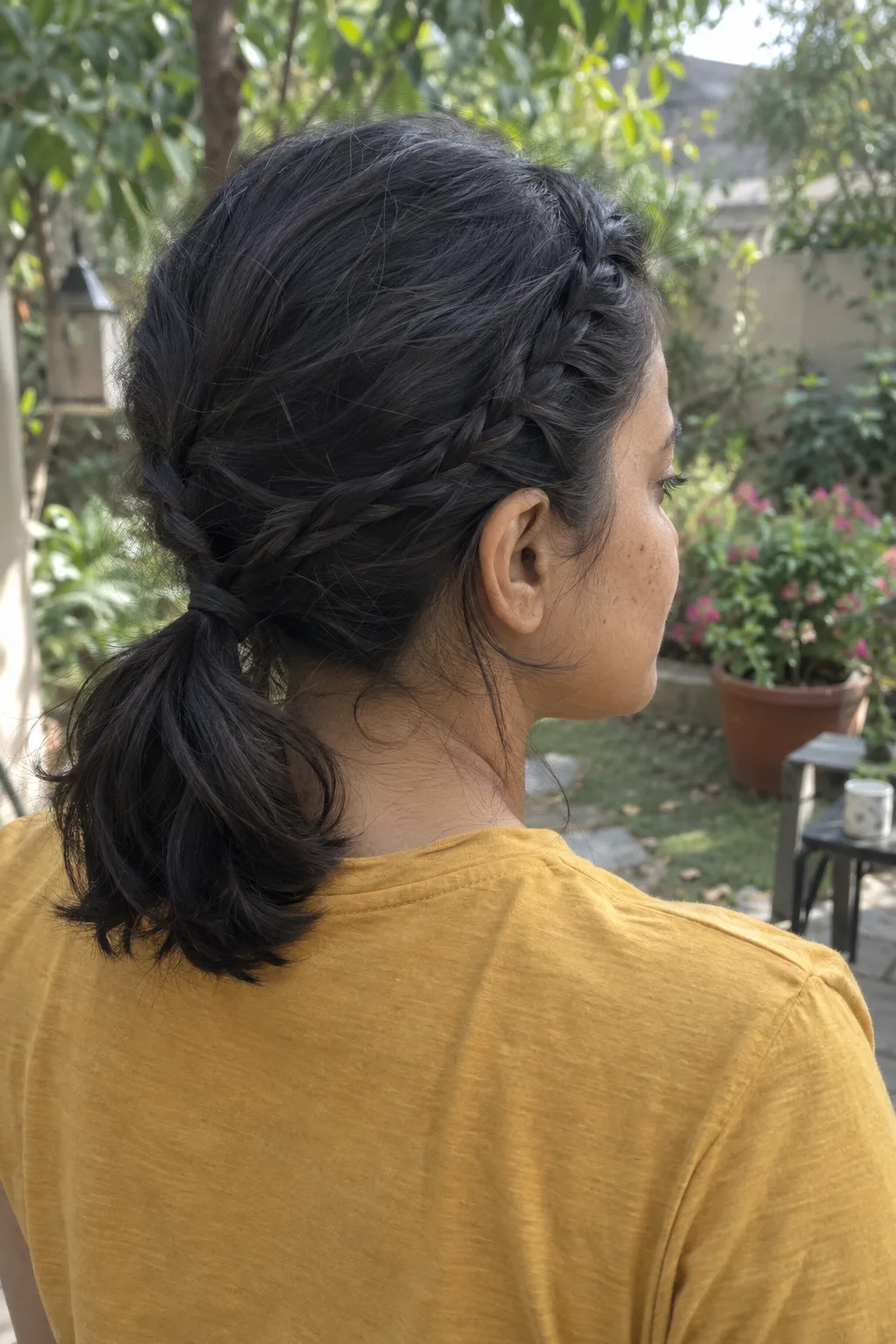 Twin Braids Into a Low Ponytail hairstyle