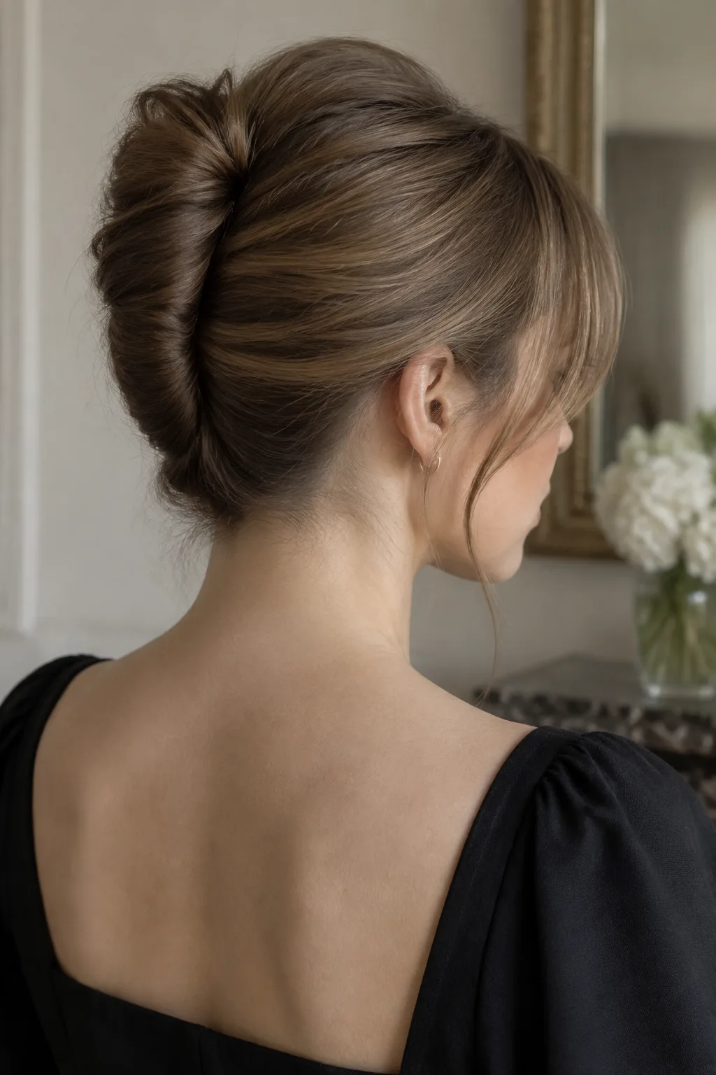 French Twist Bun With Side Bangs hairstyle