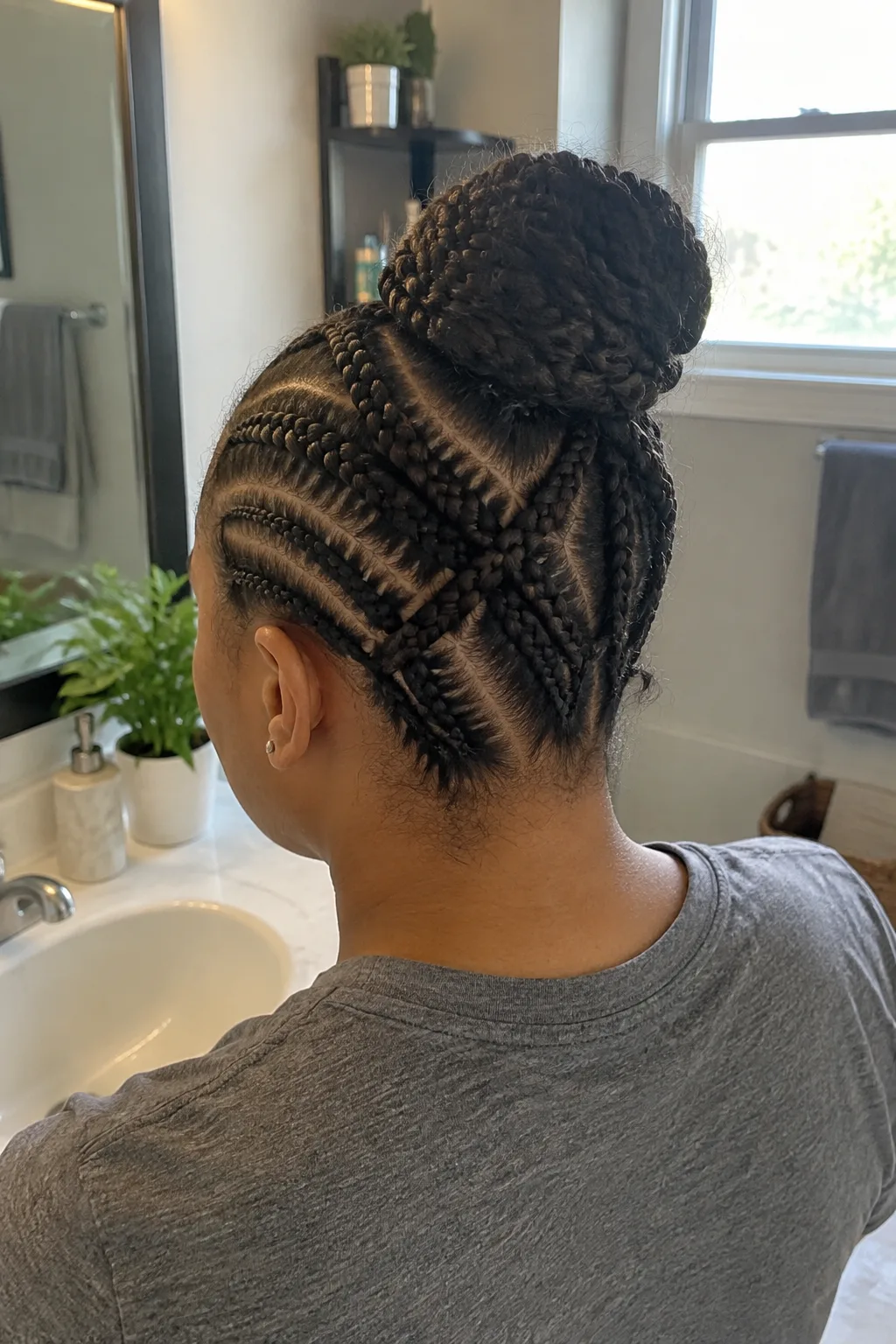 Criss-Cross Cornrows With a Bun hairstyle